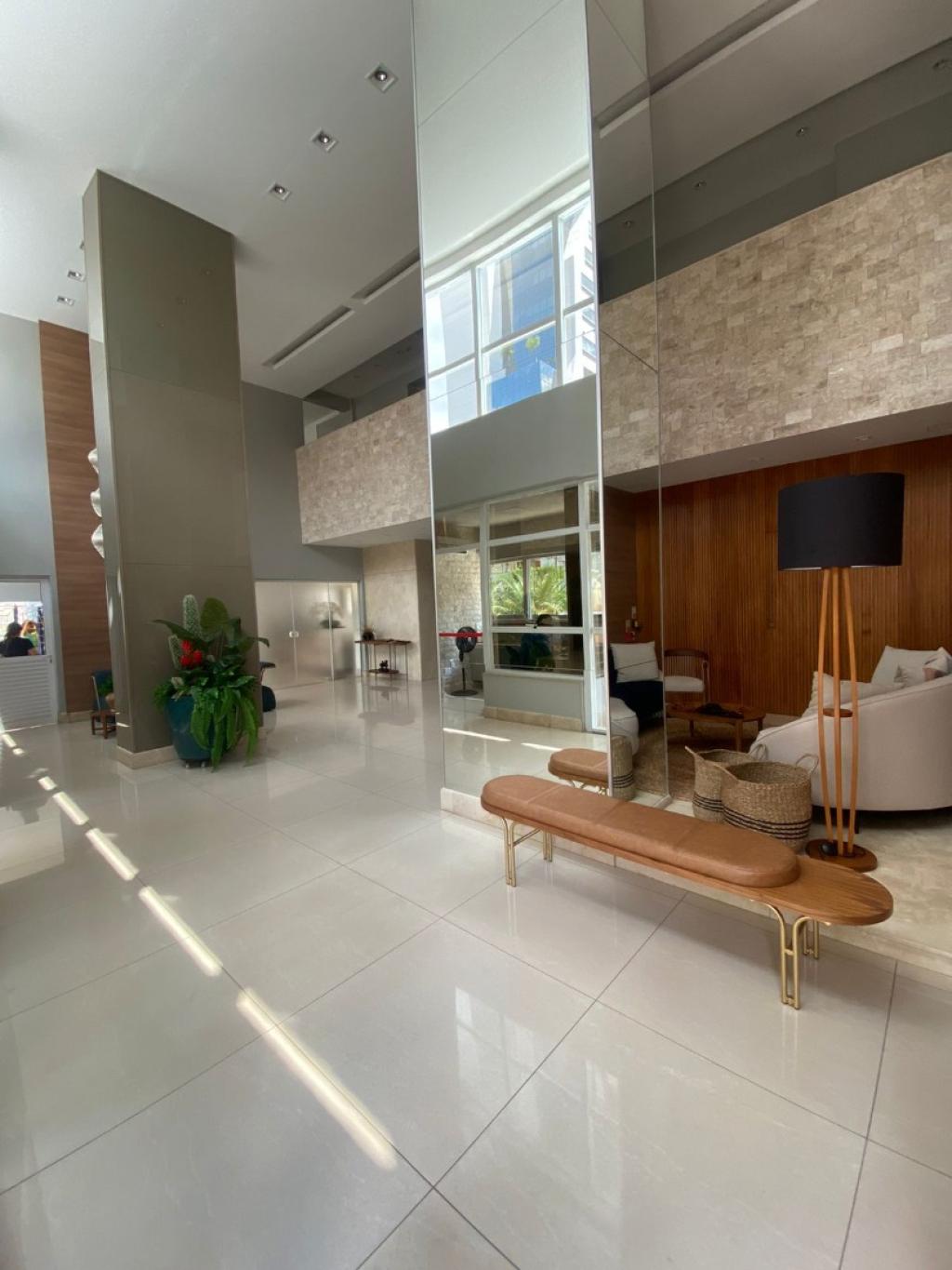 varanda gourmet completa em armários contendo 1 aparelho de ar condicionado